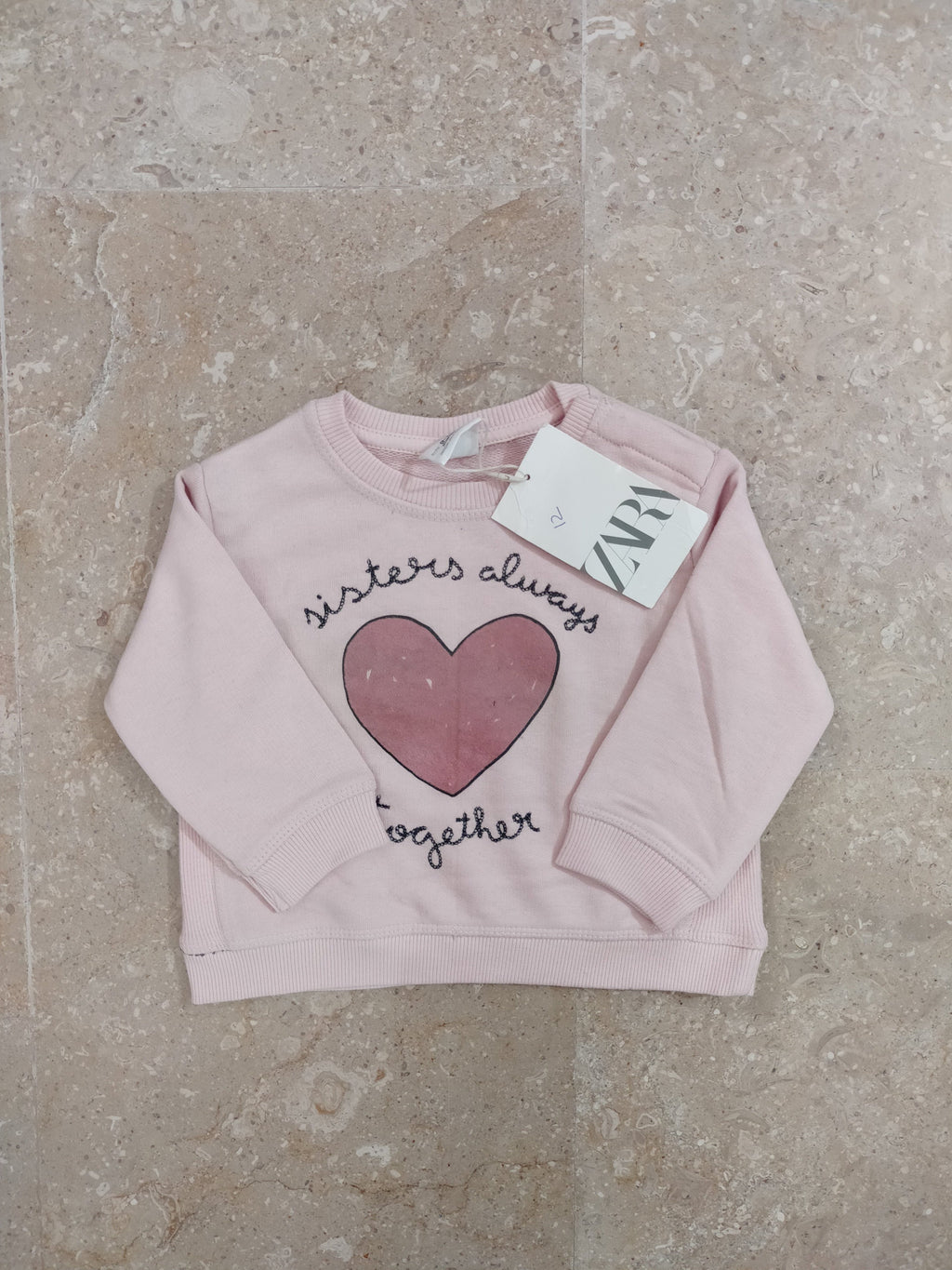 Pink branded sweatshirt